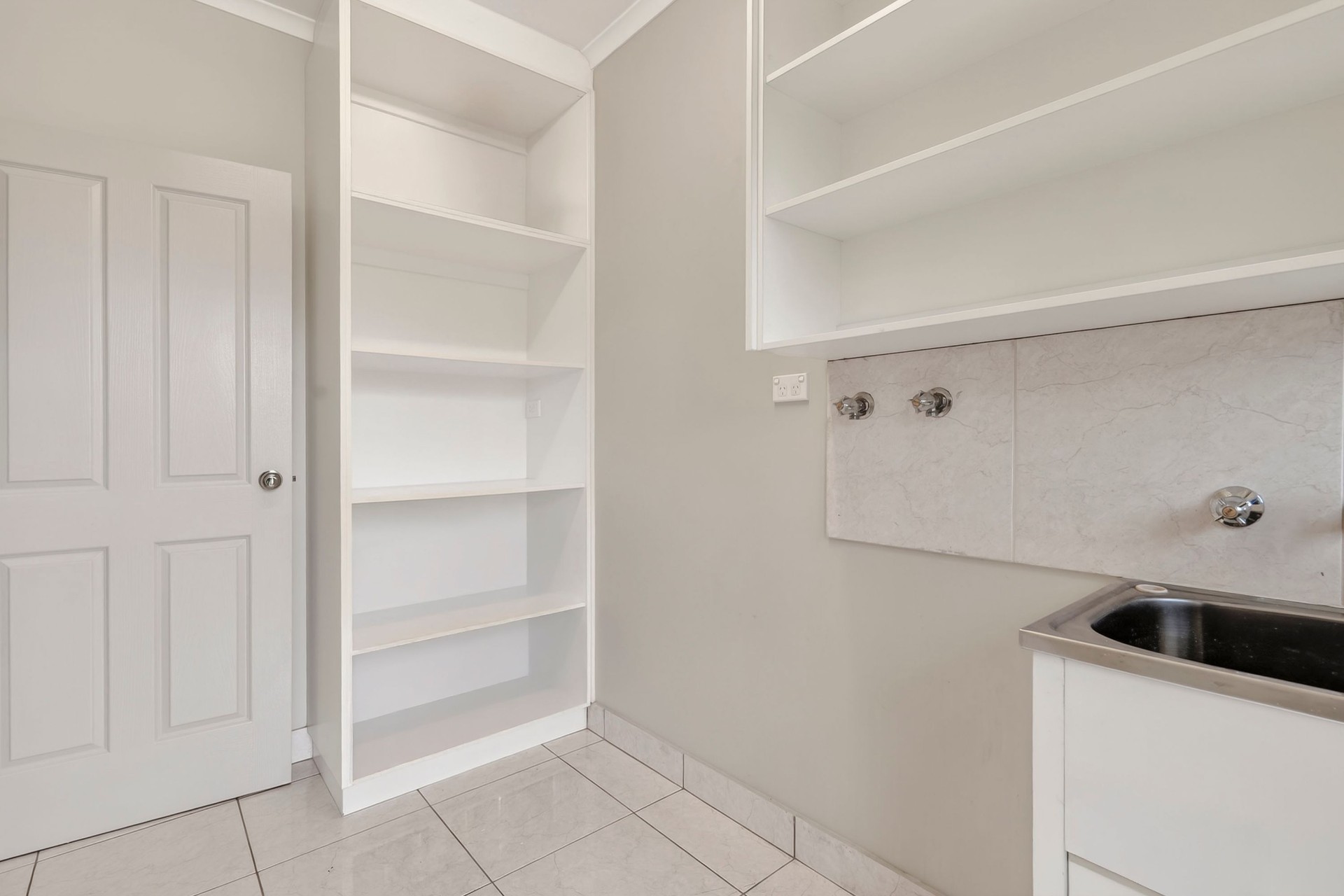 14 Riveren Court, Farrar — internal laundry with storage